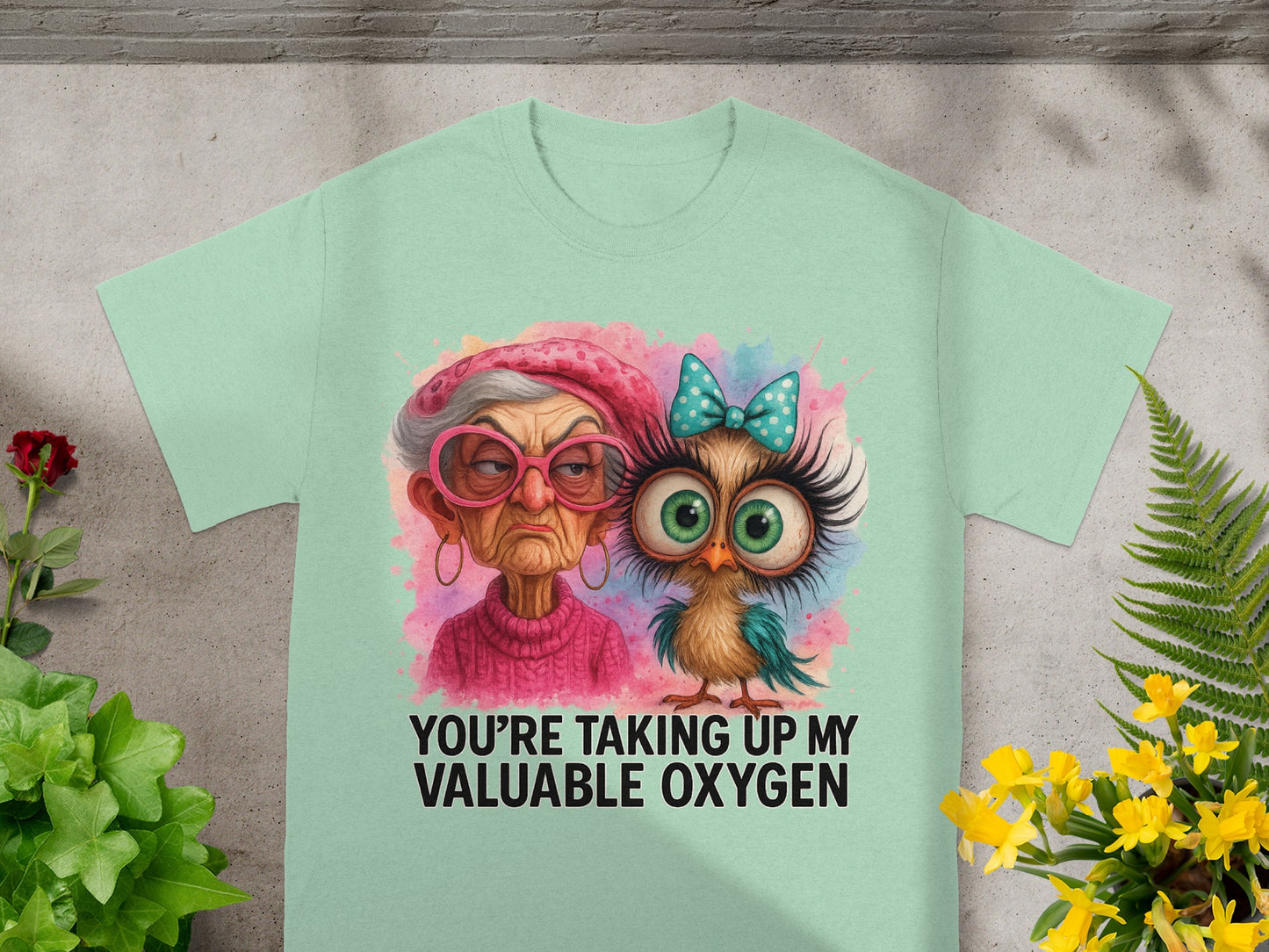 T-shirt with cartoon grandma and owl reading "You're taking up my valuable oxygen."
