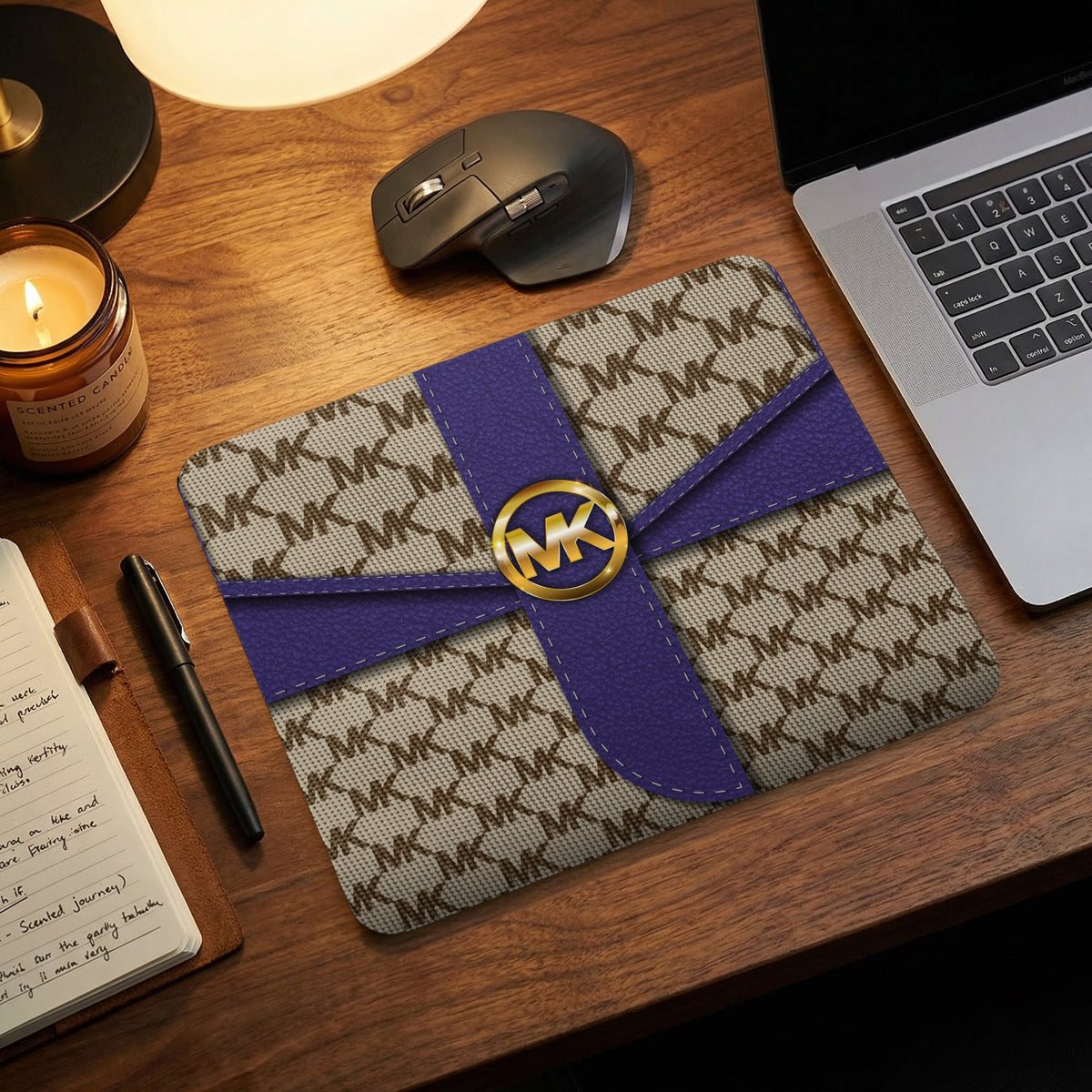 Mousepad with MK pattern, purple ribbon, and gold MK logo.