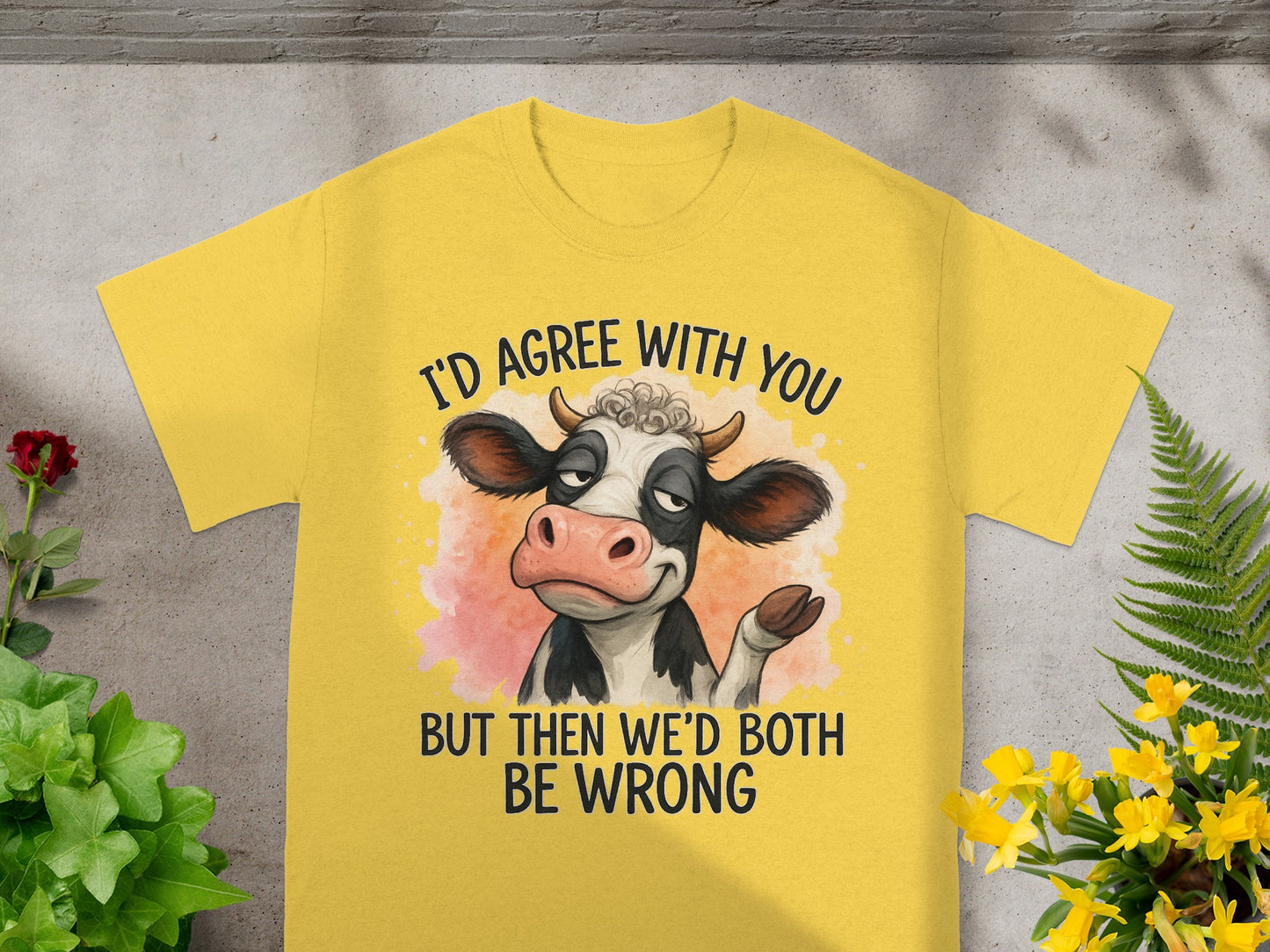 Yellow t-shirt with cartoon cow saying "I'd agree with you but then we'd both be wrong".