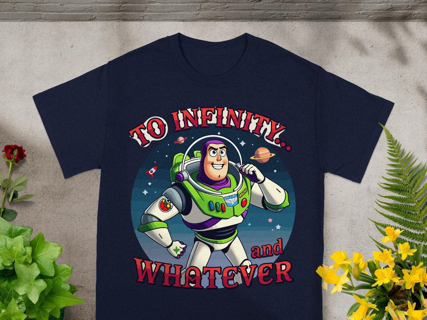 Buzz Lightyear with text "To infinity and whatever" on a navy t-shirt.