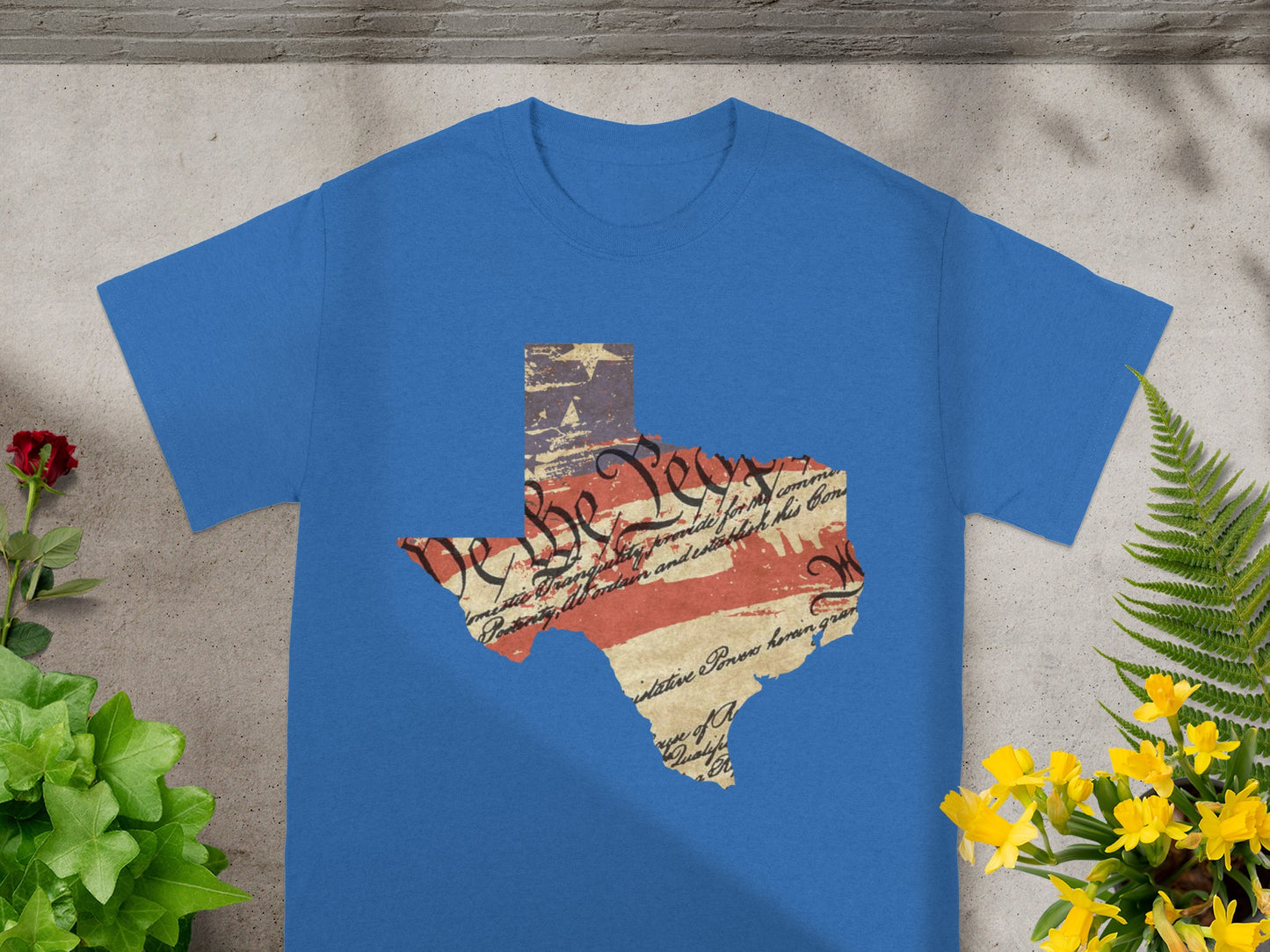 Blue t-shirt with Texas outline graphic of the Constitution and American flag.