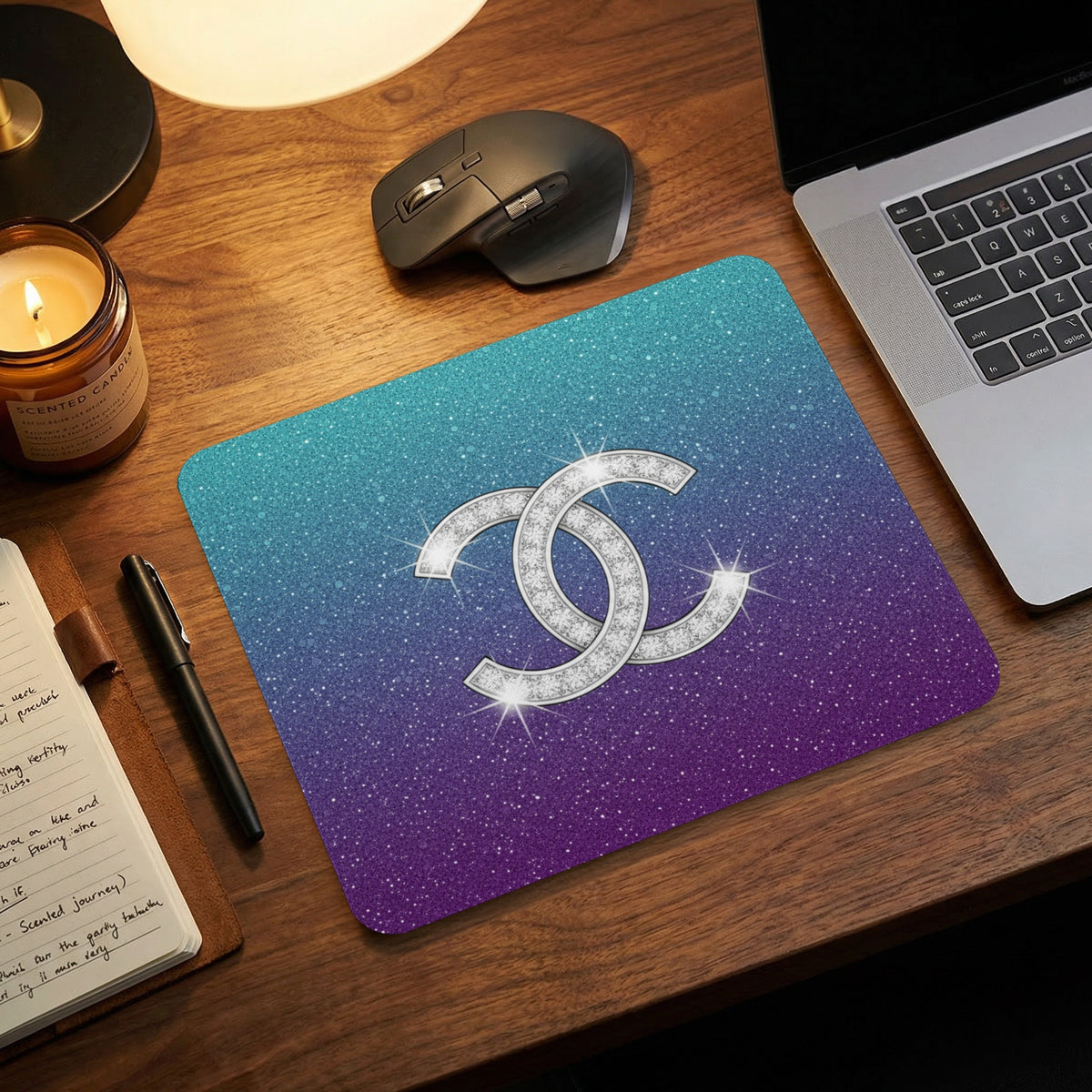 Mousepad with glittery gradient and interlocking CC logo.