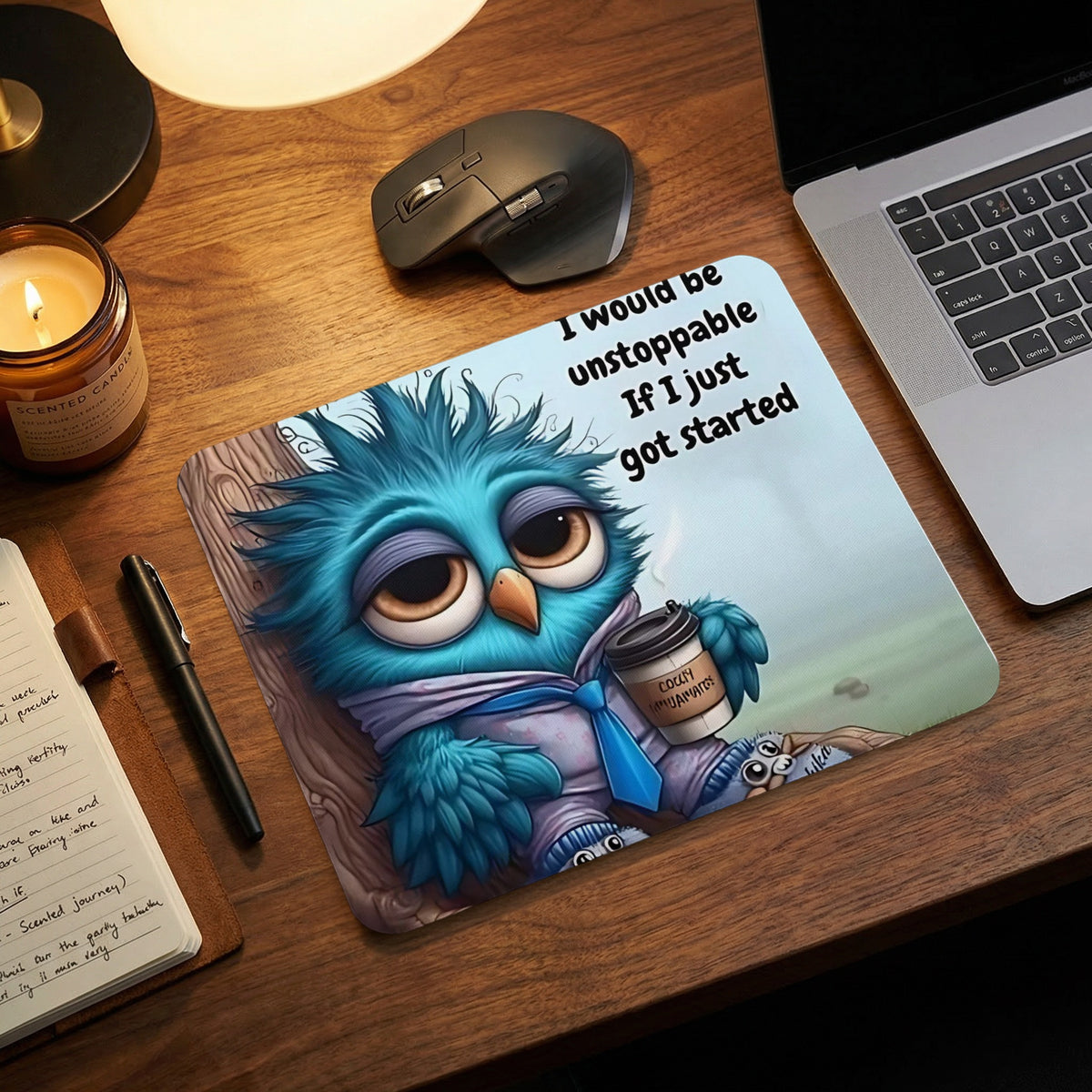 Mouse pad with a tired blue bird illustration and text that reads I would be unstoppable if I just got started.