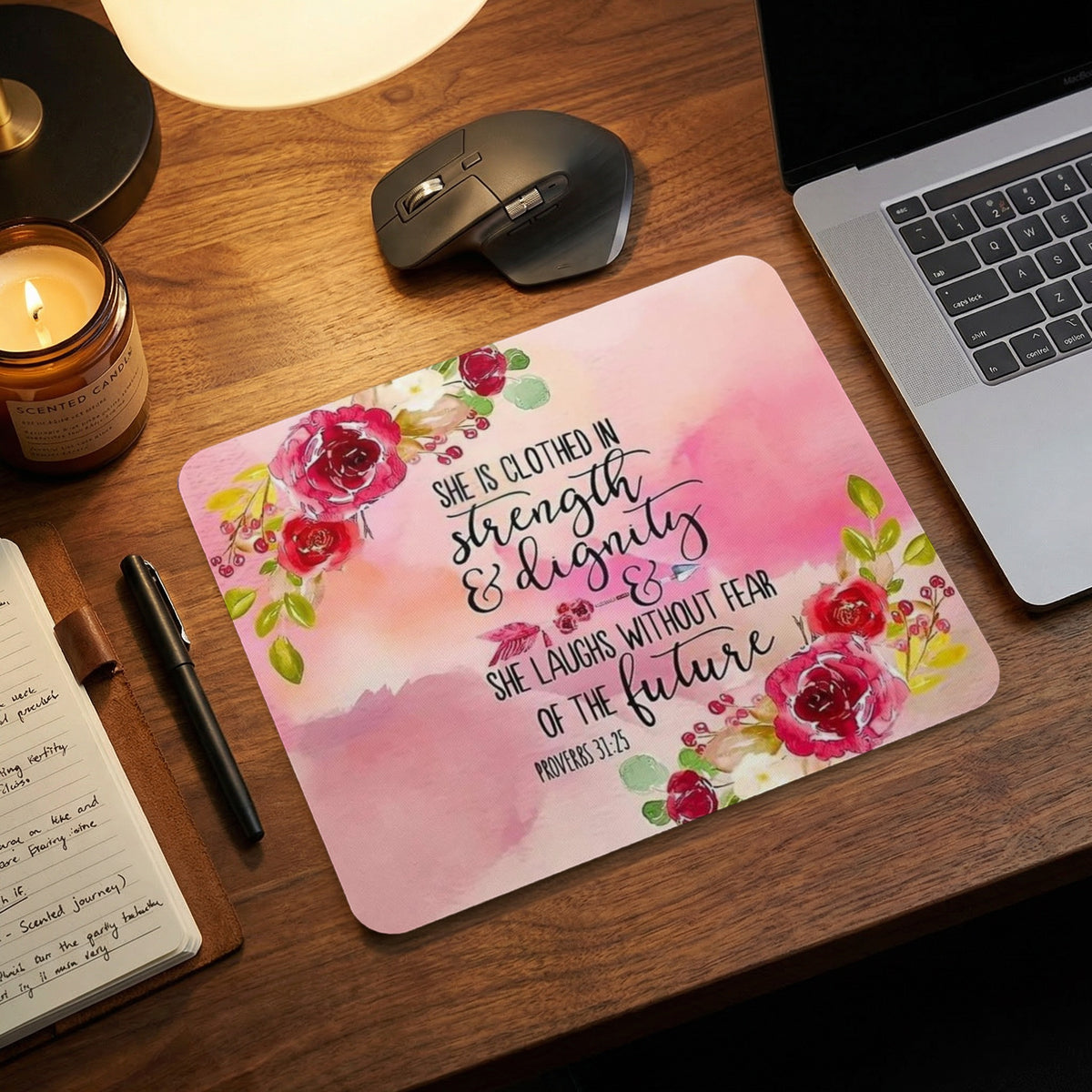 Mousepad with pink floral design and Bible verse Proverbs 31:25.