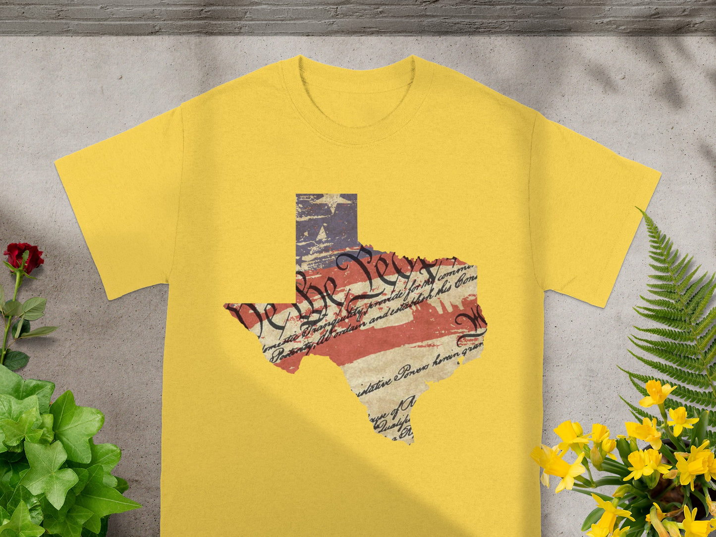 Yellow t-shirt with Texas shape graphic featuring US flag and Constitution text.
