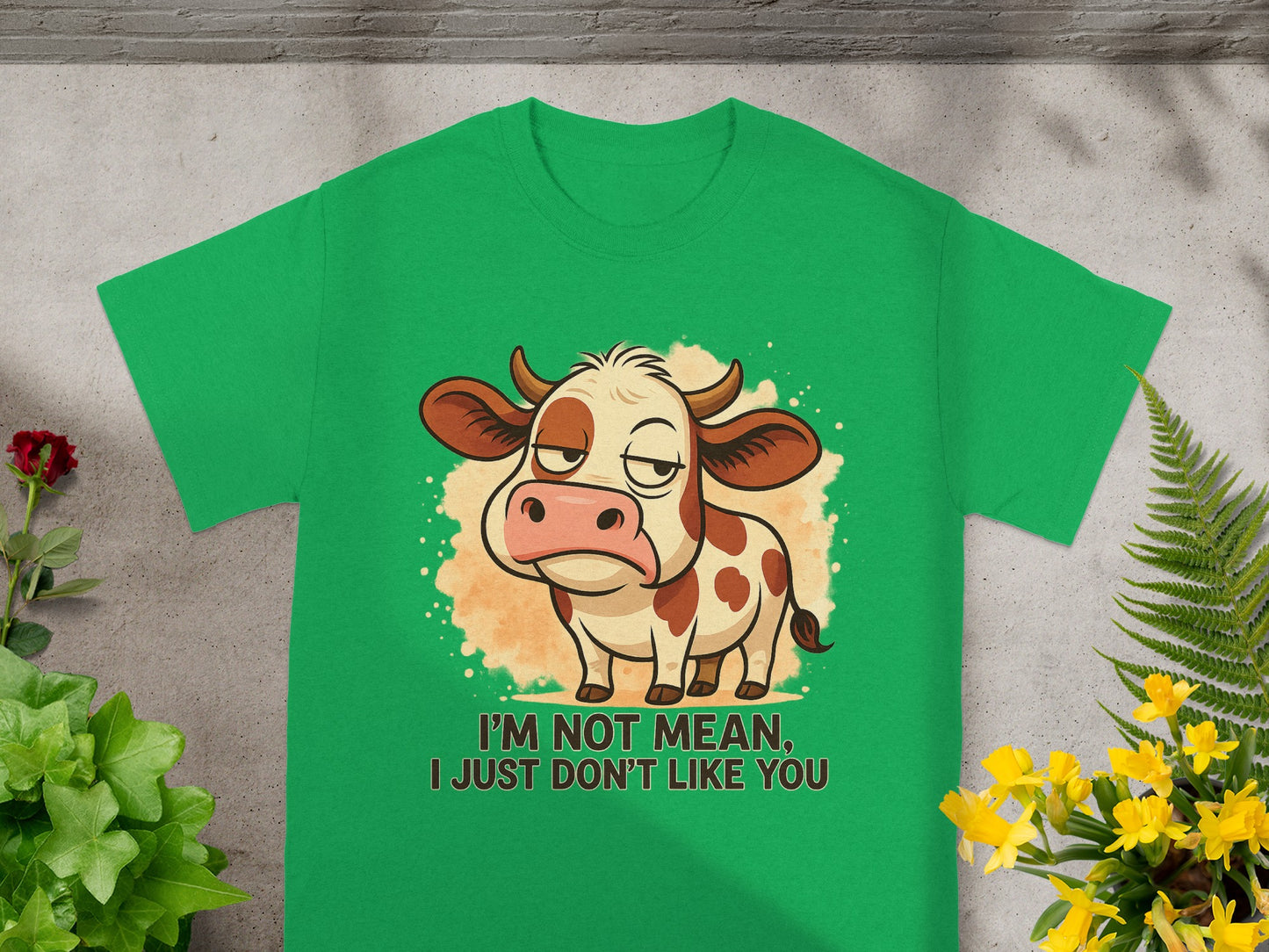 Green t-shirt with cartoon cow saying "I'm not mean, I just don't like you."