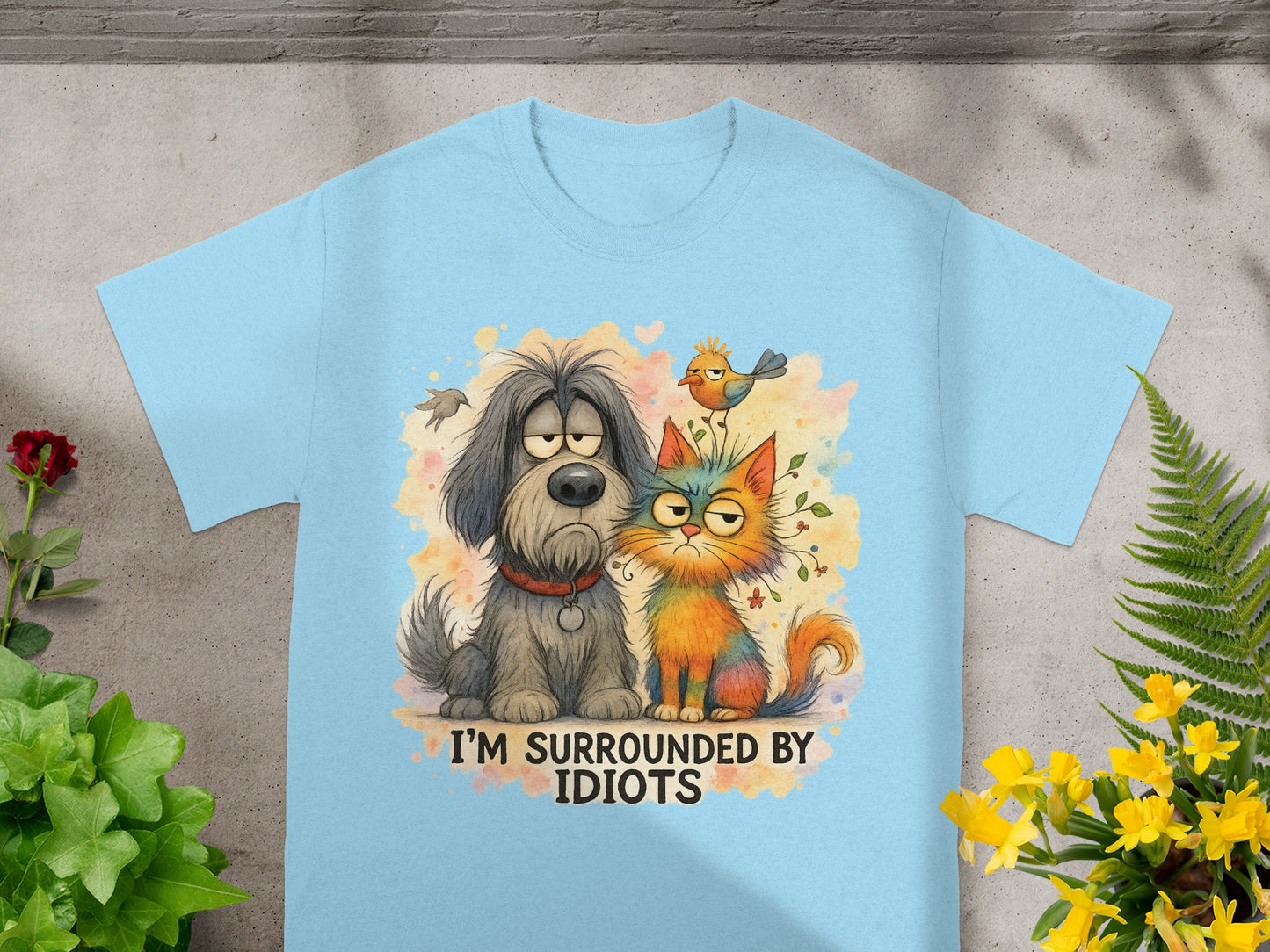 T-shirt with cartoon dog and cat saying "I'M SURROUNDED BY IDIOTS".