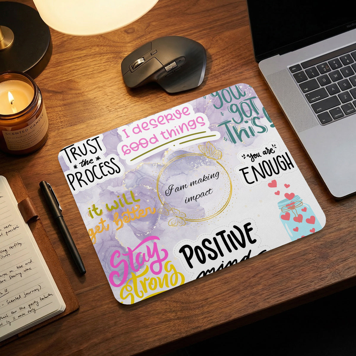 Mousepad with inspirational quotes and a jar of hearts design.