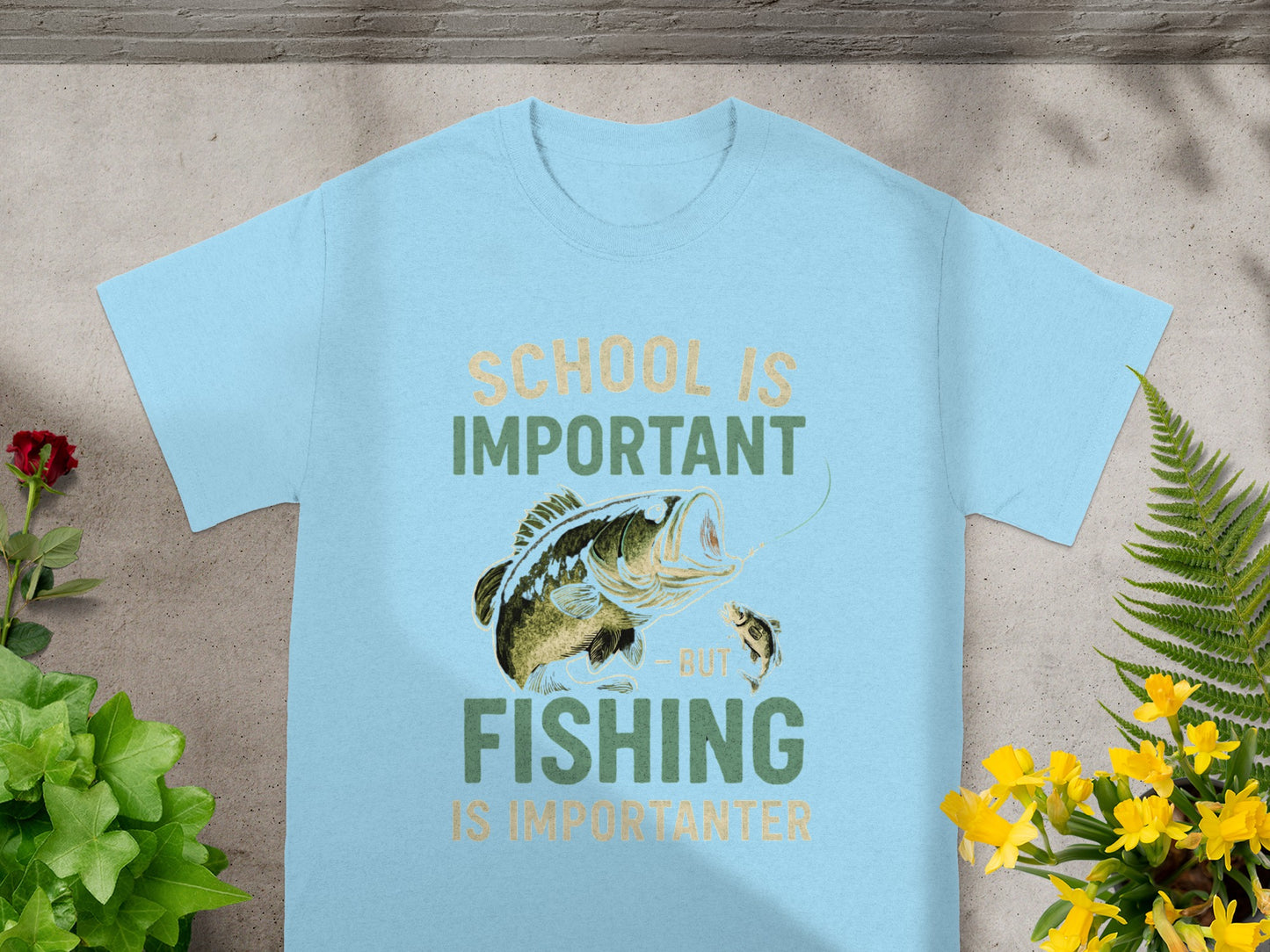 Light blue t-shirt with fish illustration and text "School Is Important But Fishing Is Importanter".