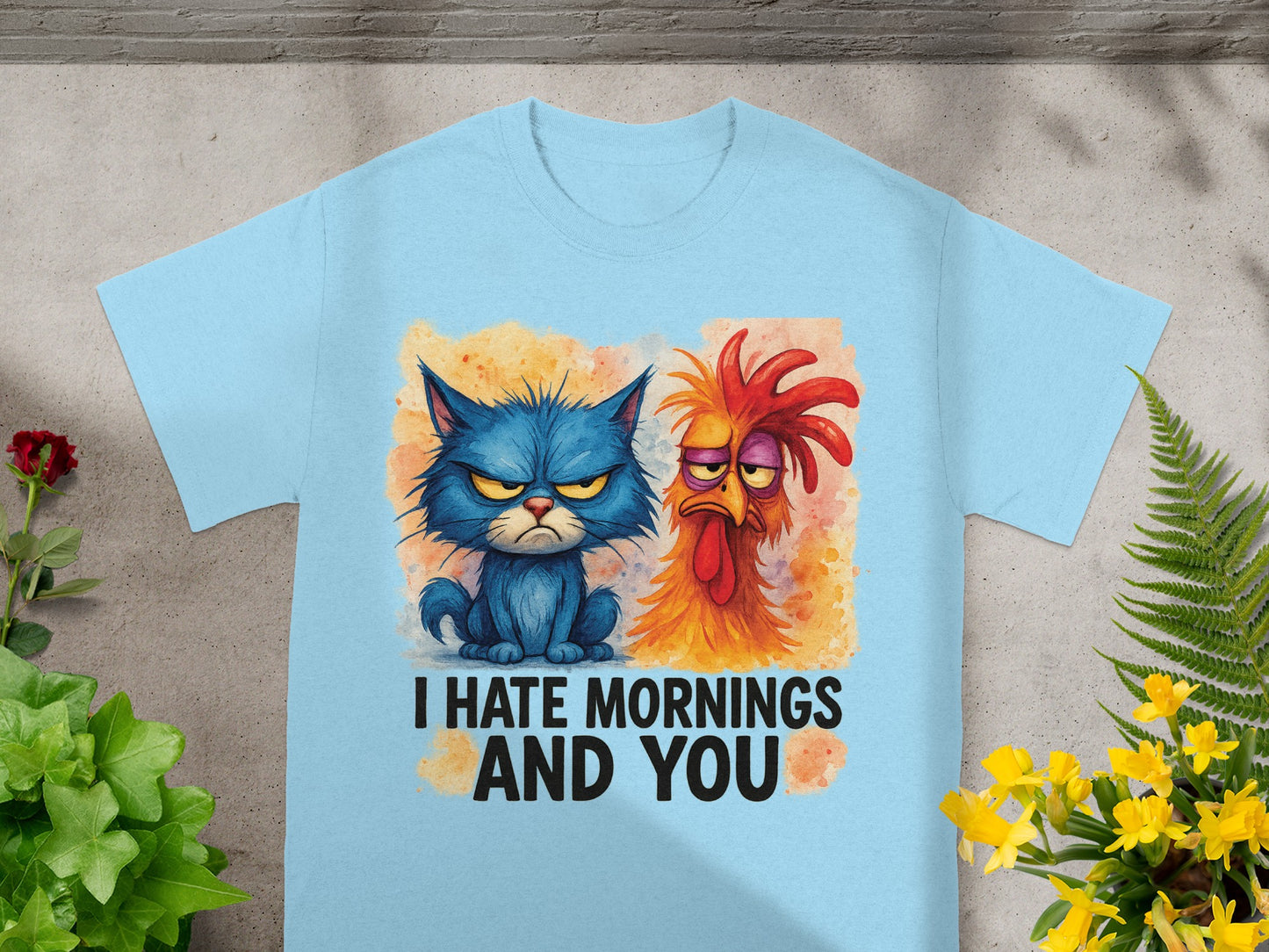 Blue t-shirt with grumpy cat and rooster graphic and text "I HATE MORNINGS AND YOU".