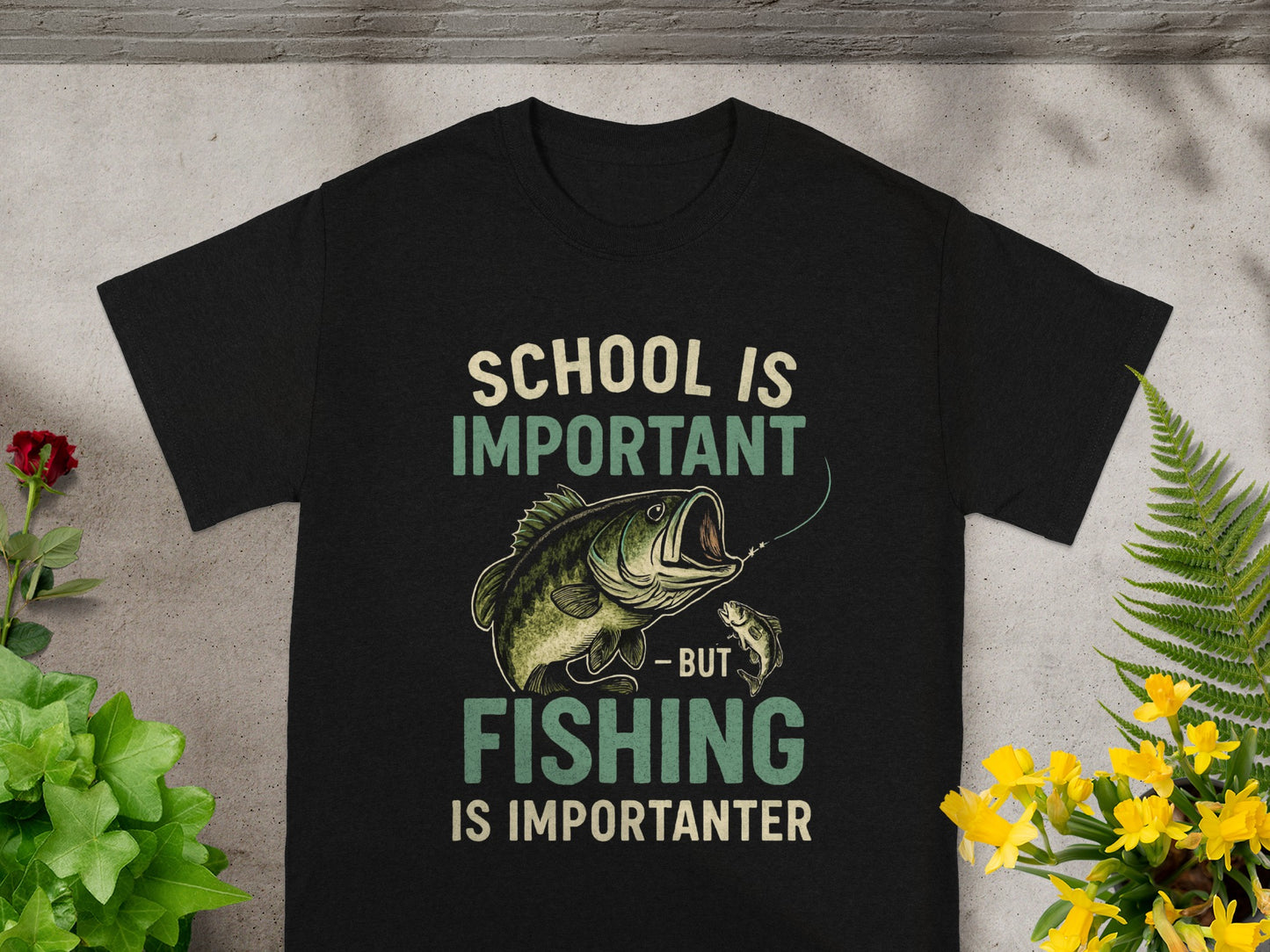 Black t-shirt with "School is Important - But Fishing is Importanter" text and fishing graphic.