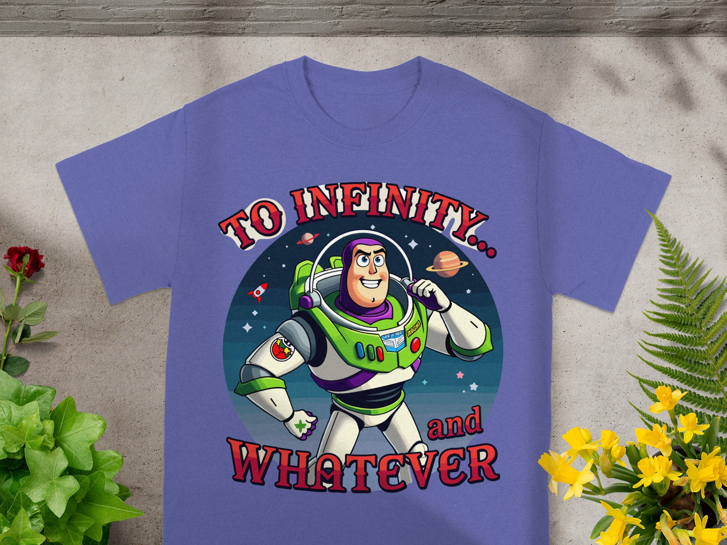 Buzz Lightyear illustration on a purple t-shirt with "TO INFINITY... and WHATEVER" text.