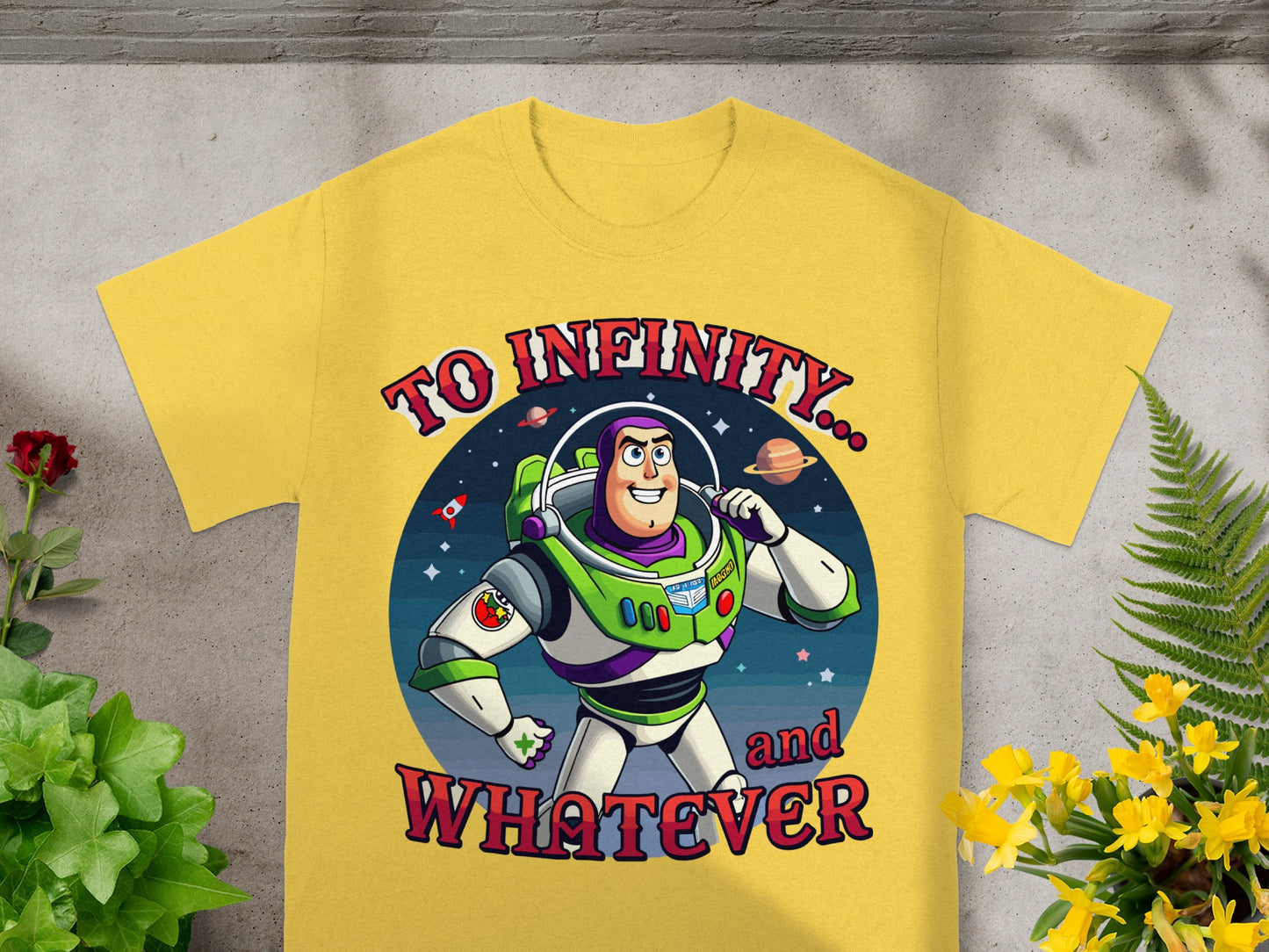Buzz Lightyear graphic on yellow t-shirt says "To Infinity... and WHATEVER".