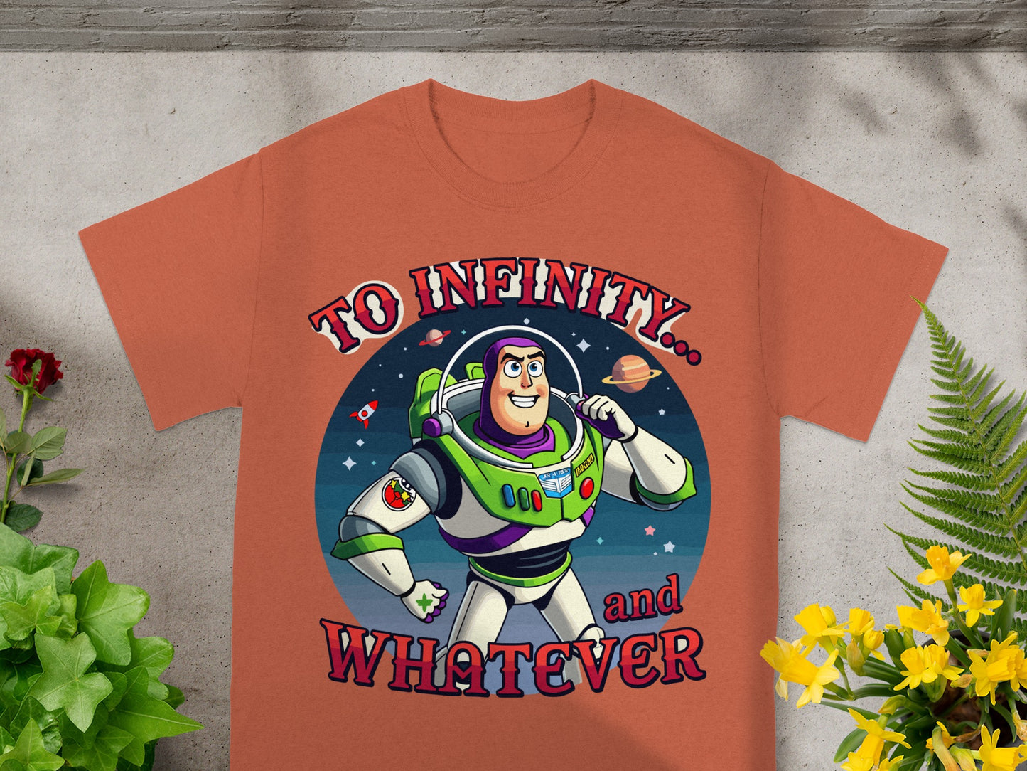 Buzz Lightyear on a t-shirt with text "To Infinity... and WHATEVER".
