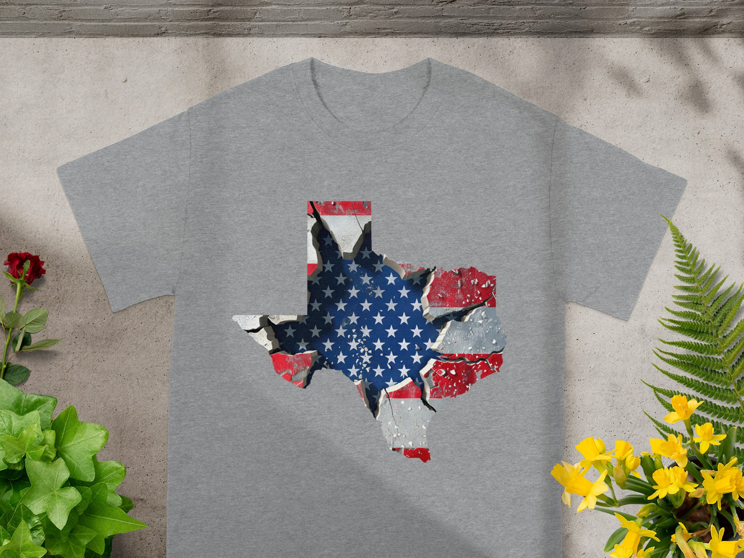 Gray t-shirt with a distressed Texas outline filled with the American flag.