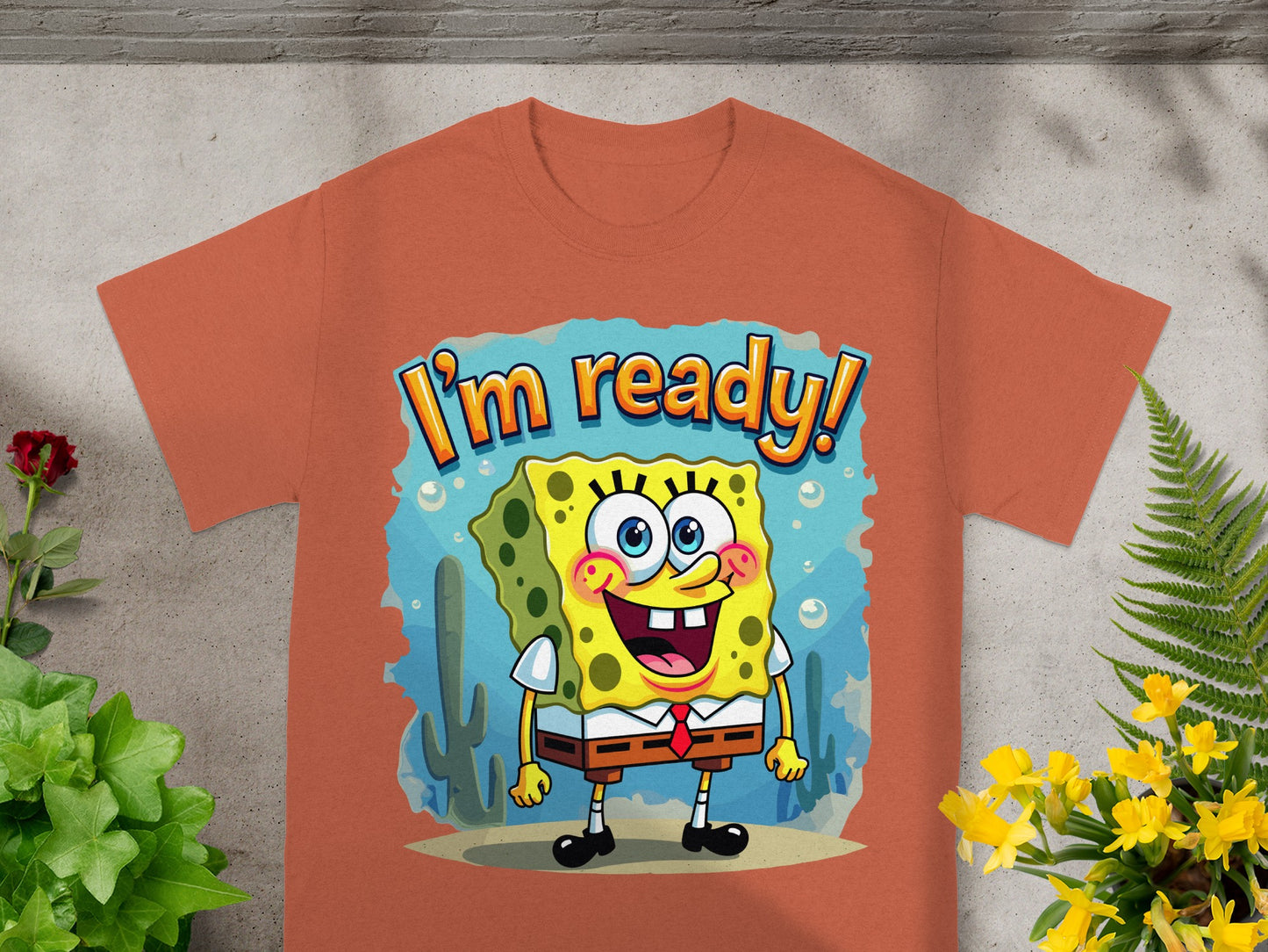 Orange t-shirt with Spongebob Squarepants character graphic saying "I'm ready!".
