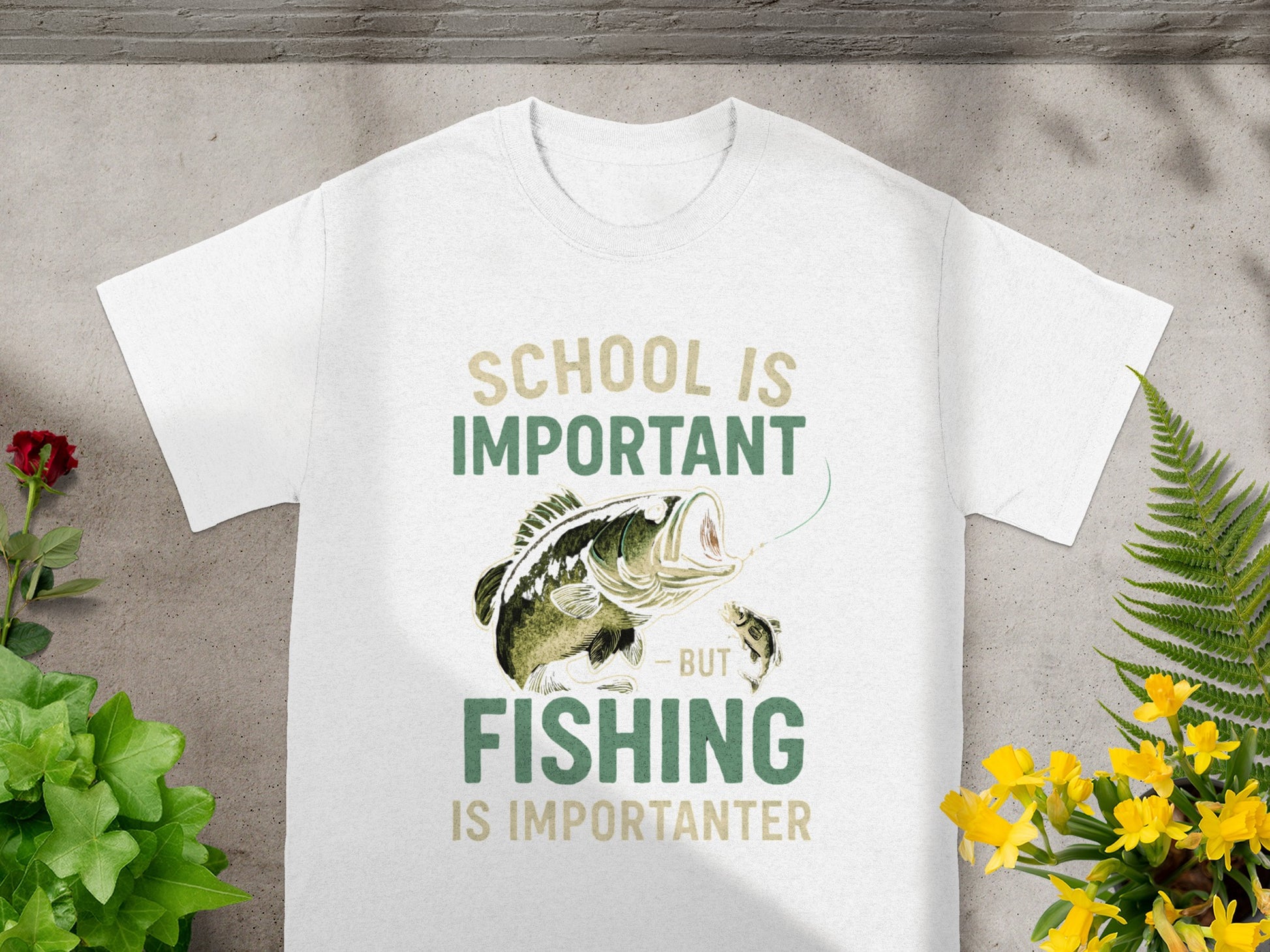 White t-shirt with "School is Important but Fishing is Importanter" text and fish graphic.