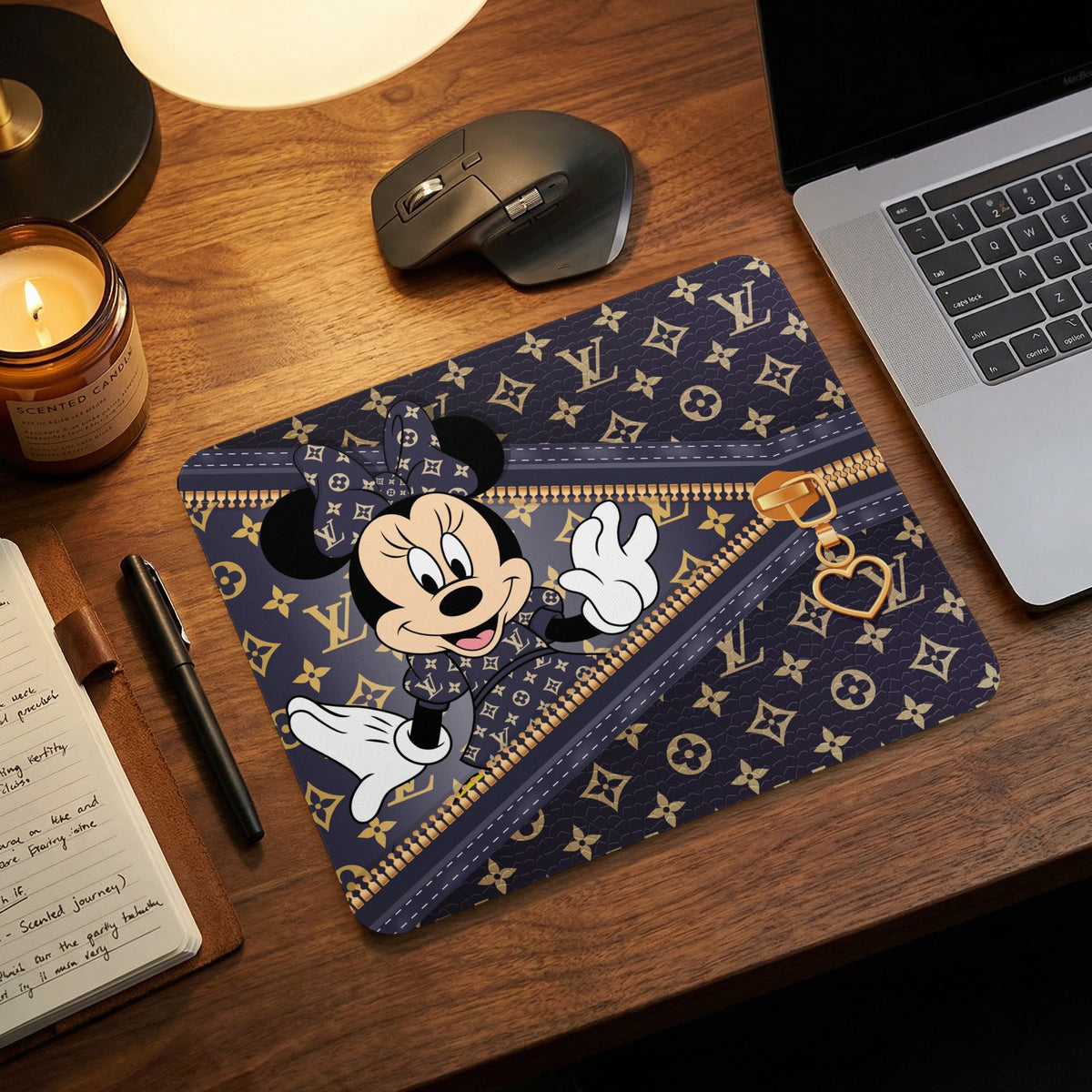 Minnie Mouse on dark blue LV-patterned mousepad with gold zipper detail.