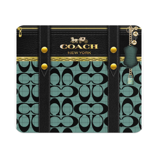Coach pattern with gold chain trim, leather straps, and gold horse and carriage logo.