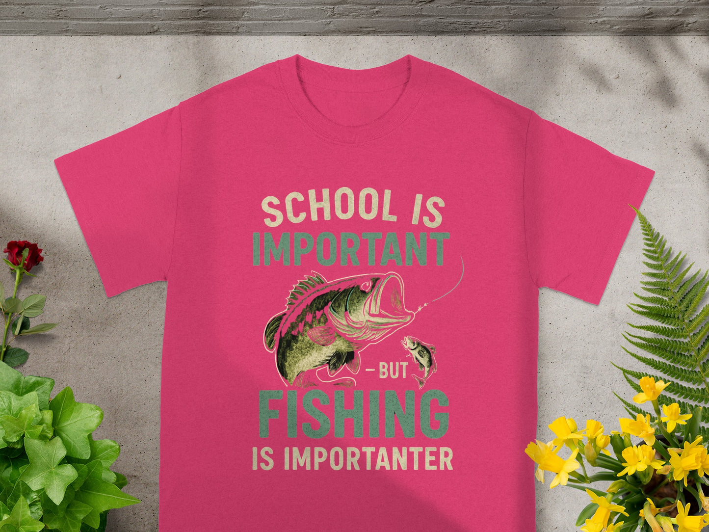 T-shirt with text "school is important - but fishing is importanter" and fish graphic.