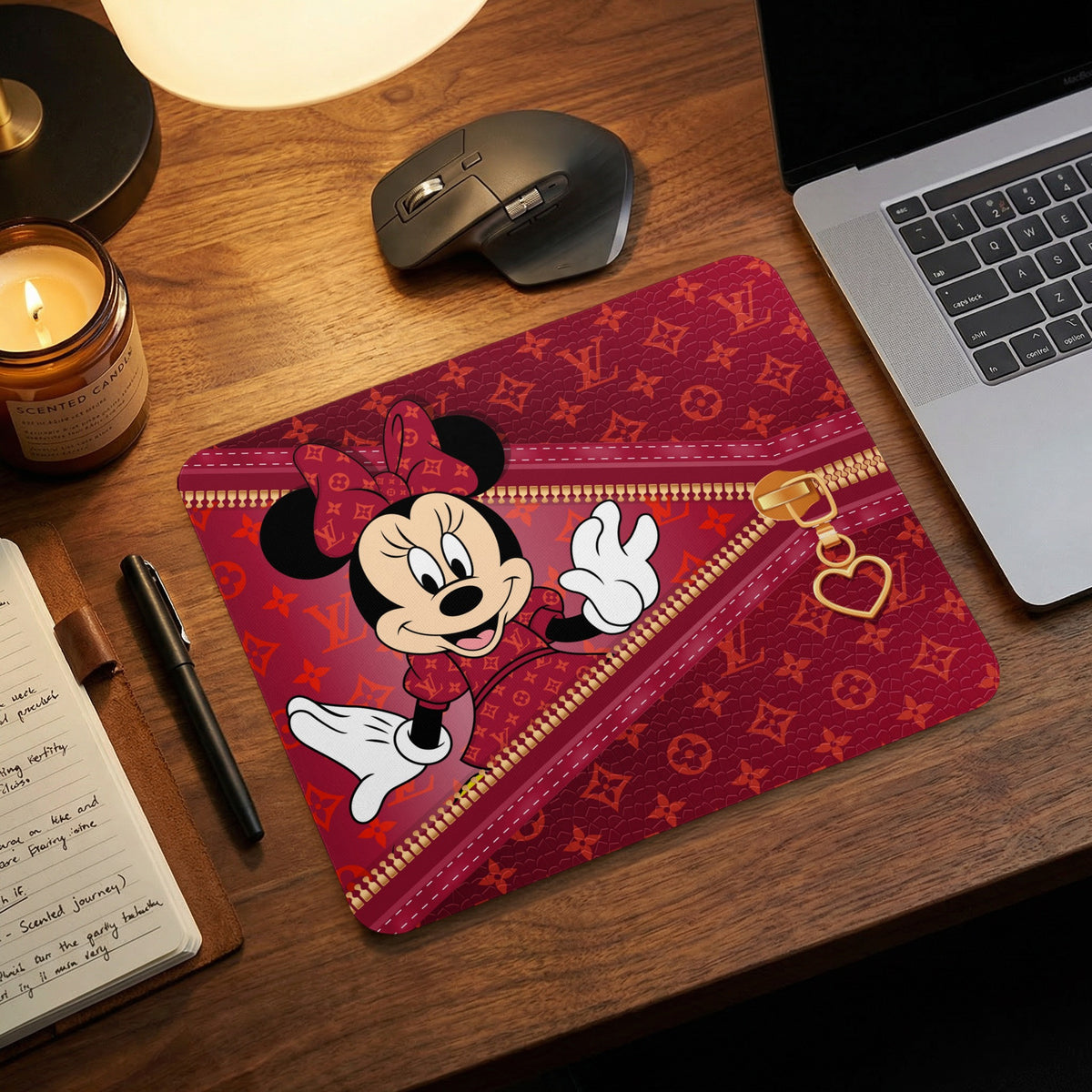 Minnie Mouse on a red mousepad with Louis Vuitton-inspired pattern and gold zipper.